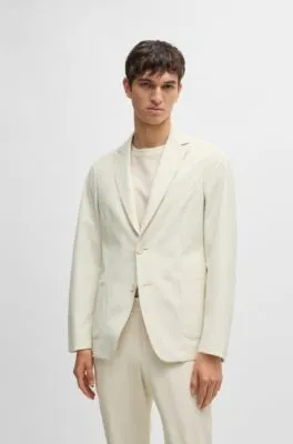 Chaqueta slim fit en tejido elástico técnico antiarrugas