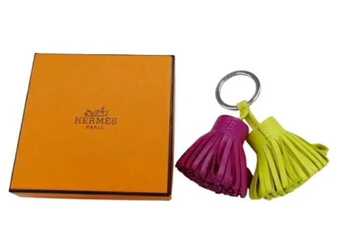 Llave de cuero Hermès en lima y púrpura Dorado 